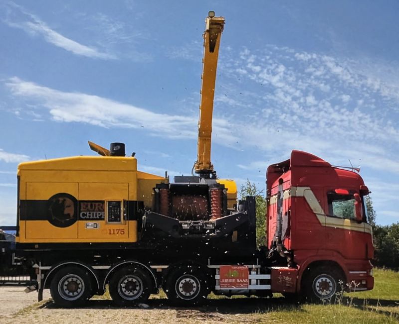 Europe Forestry EC 1175 truck-mounted biomass chipping in action