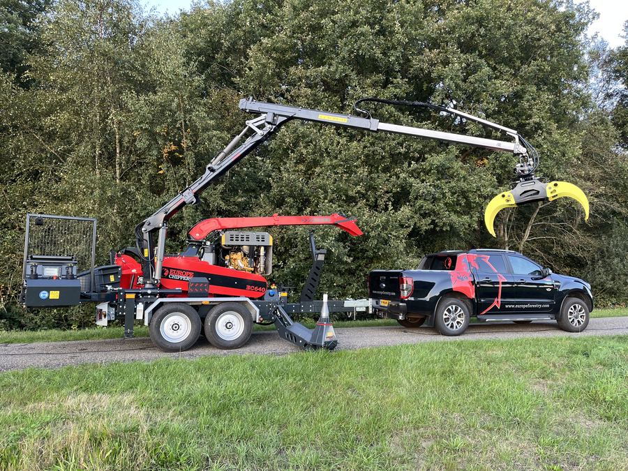EC 640 trailer with crane forest setting